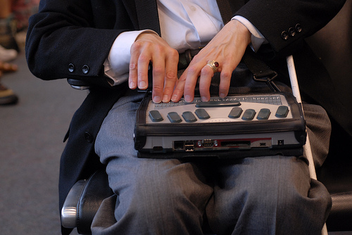 Person using Braille display, photo credited to holisticmonkey on flickr
