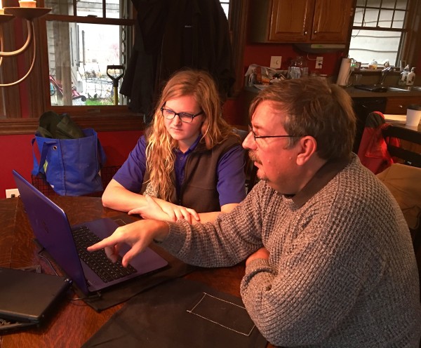 gabrielle and jim training on laptop