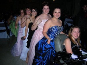 Laura with friends at high school prom 