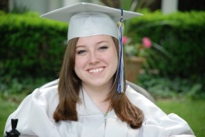 laura in cap and gown at graduation