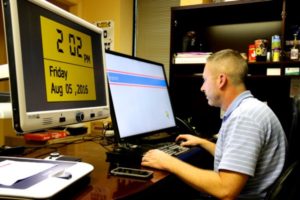 greg working at his desk