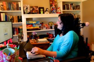 Alina at her desk