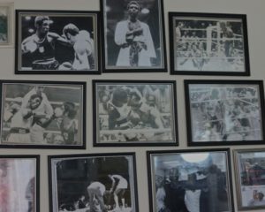 pictures of Ray's fights on his office wall