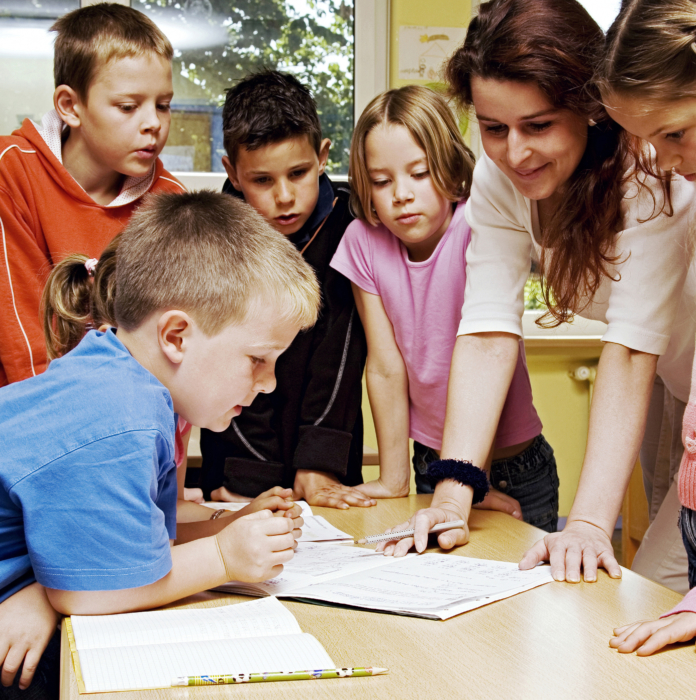 Students gathered around table