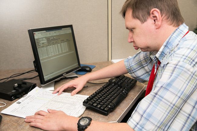 man working at computer