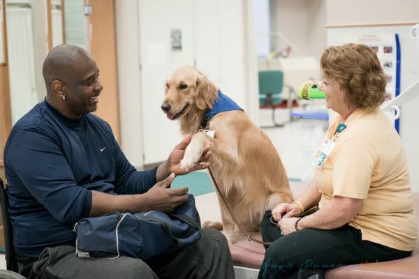 Patient with dog for rehabilitation