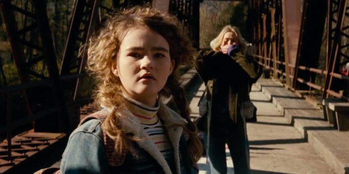 Millicent Simmonds on bridge in A Quiet Place