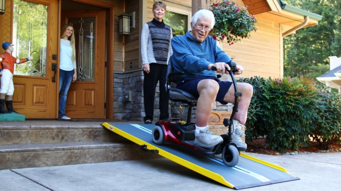 Man using suitcase ramp