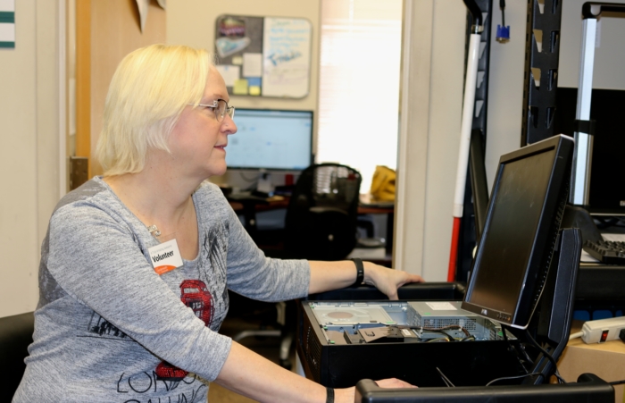 Lora working on a computer