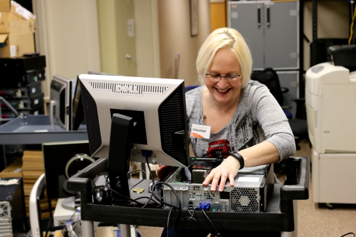 Lora working on a computer