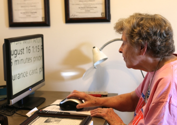 Mildred using desktop CCTV