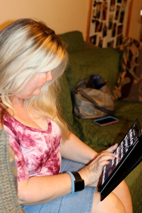 Melissa using magnification on iPad