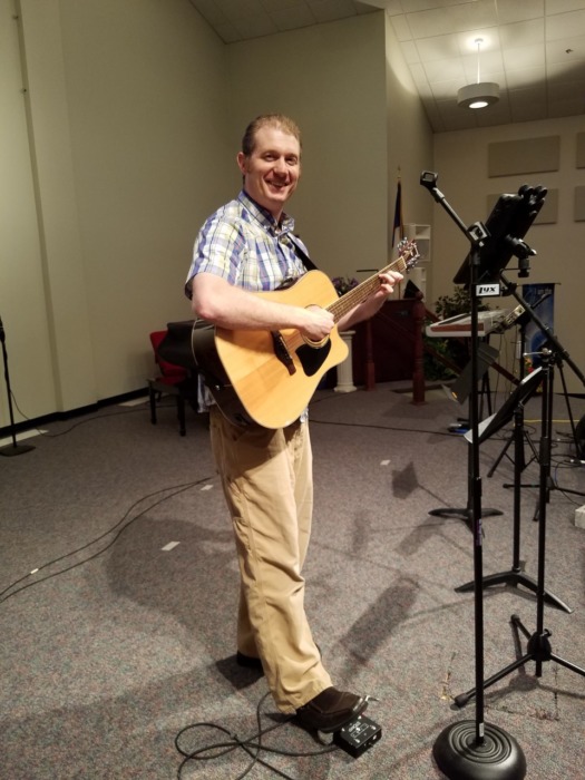 Mike DiSanto playing guitar