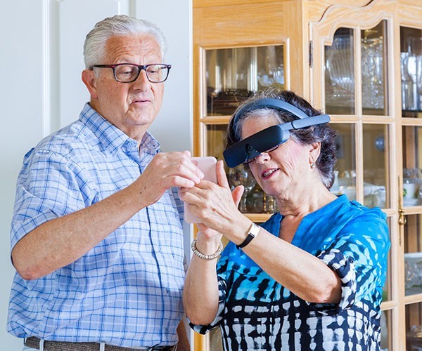 Couple using eSight4 glasses