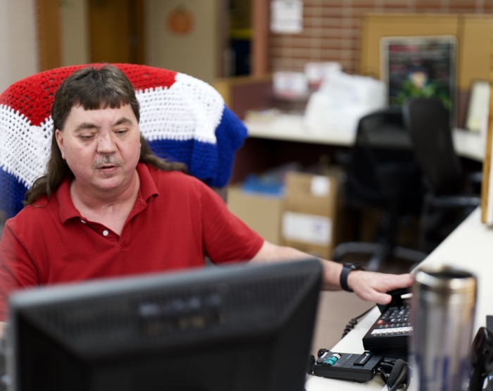 Randy Berg working at his desk