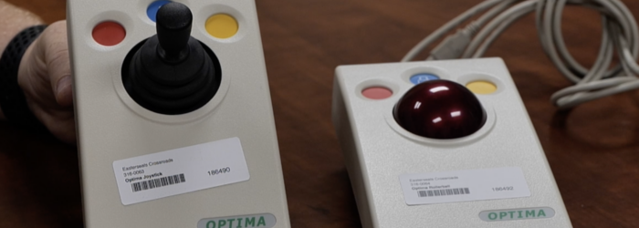 a photo of optima joystick and optima trackball