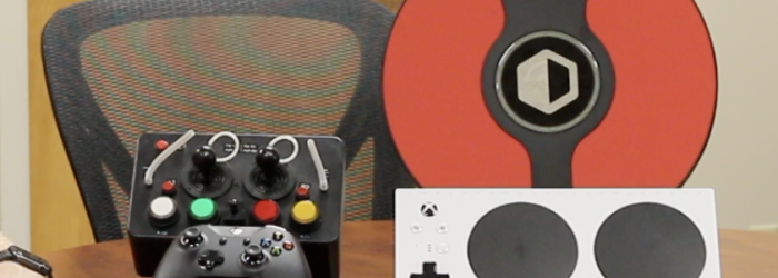 a few accessible gaming controllers on a table