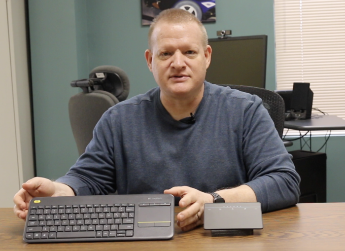 Brian Norton showing 2 touch pad mouse systems on a table