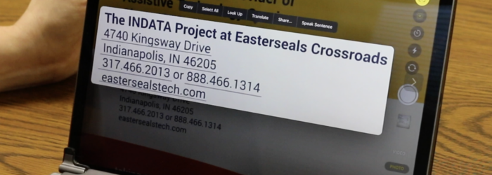 screen shot of OCR Live Text button and camera focused on an INDATA brochure