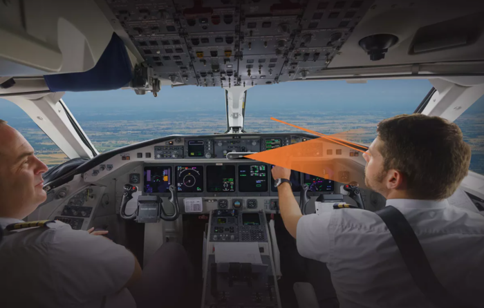 Man using Eyeware training in an airplane