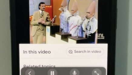 Screenshot of iPhone with Live Captions on captioning a video from Saturday Night Live