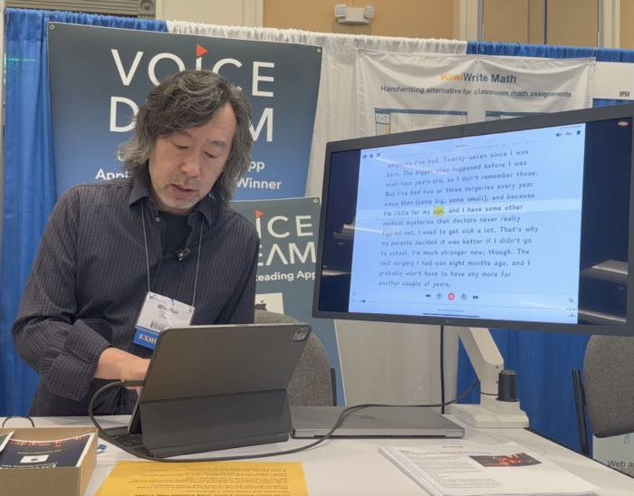 Screenshot of Winston Chen demonstrating Voice Dream on his iPad to a large desktop monitor