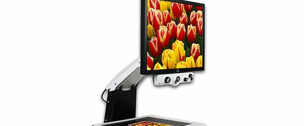 i-see desktop video magnifier with flowers on screen