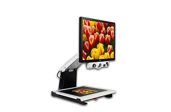 i-see desktop video magnifier with flowers on screen